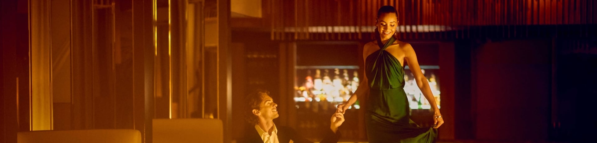 couple walking on sofa