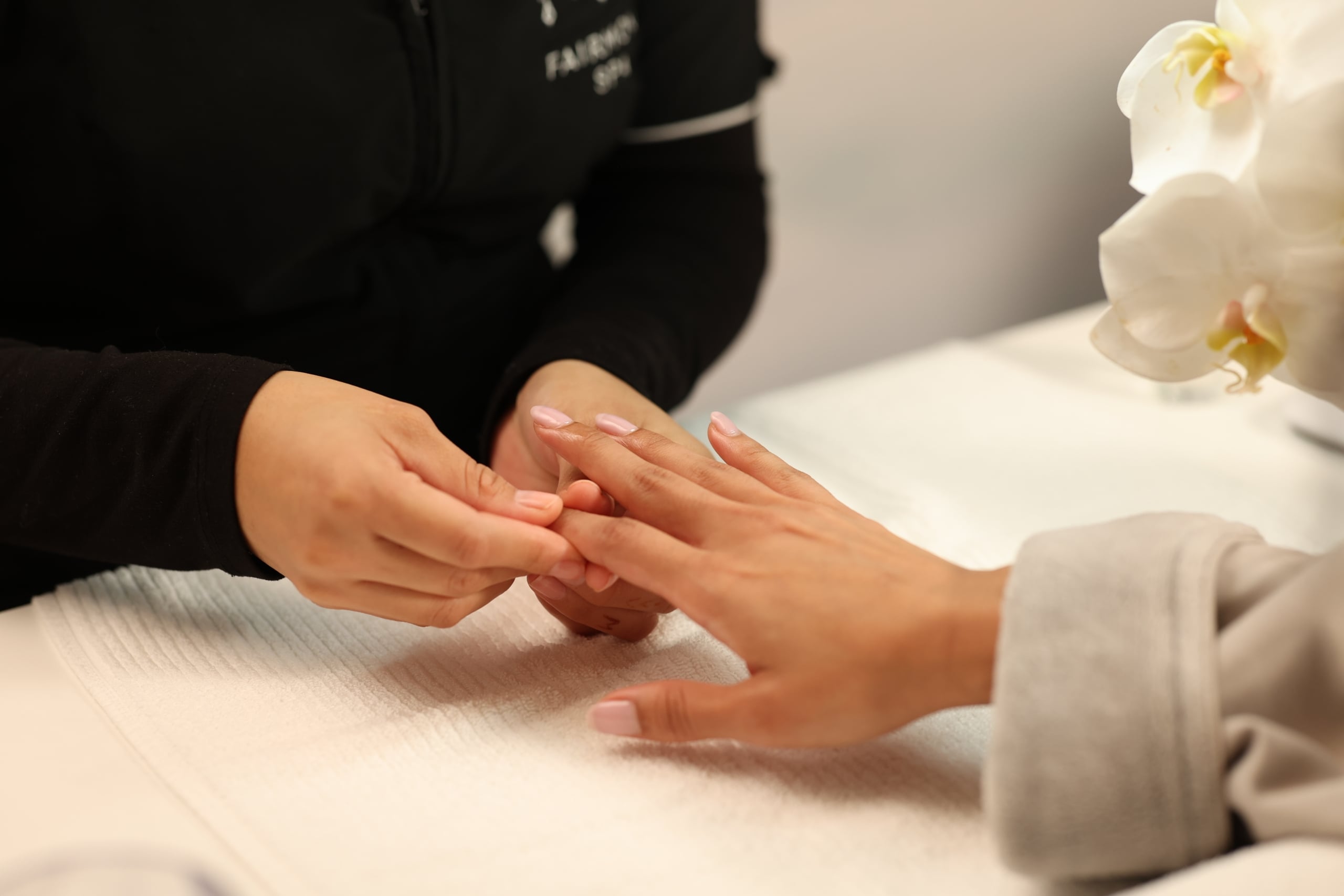 women receiving manicure at Fairmont Spa Austin